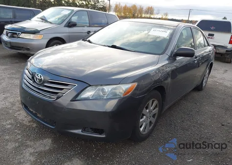 2007 Toyota Camry Hybrid z USA, uszkodzony, nr VIN JTNBB46K573033485